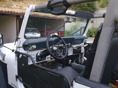 jeep cj7 2800 TD
Motore Frontera 2800 TD, ponti Patrol GR Y60,cambio 5 marce Frontera 2000 sport, Gomme 35x12,50x15, balestre Oldmanemu sopra i ponti, carrozzeria allargata nei parafanghi
